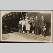 Group of Issei and Nisei gathered in front of a train (ddr-densho-259-198)