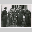 Soldier with civilians in Bruyeres (ddr-densho-1007-39)