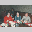 Three people sitting at a table (ddr-densho-426-2219)