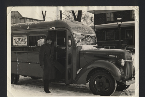 Photograph of Frank Muench in front of school bus (ddr-csujad-55-2632)