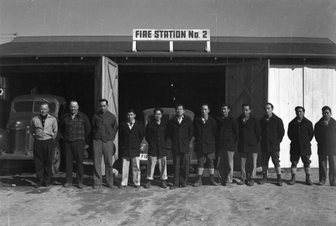 Firemen standing in front of Fire Station No. 2 (ddr-fom-1-764)