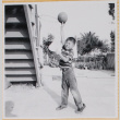 William Shiomi with basketball (ddr-densho-522-257)
