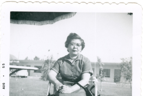 Woman in lawn chair (ddr-densho-430-205)