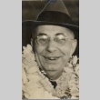 Man wearing leis (ddr-njpa-2-873)