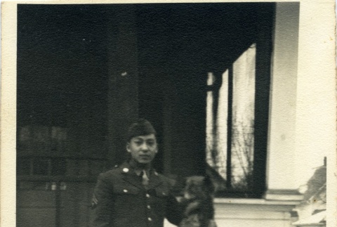 Herbert K. Yanamura with a dog (ddr-densho-22-374)