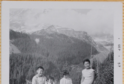 Yoshiko, William, Susan and Leslie Shiomi on overlook (ddr-densho-522-424)