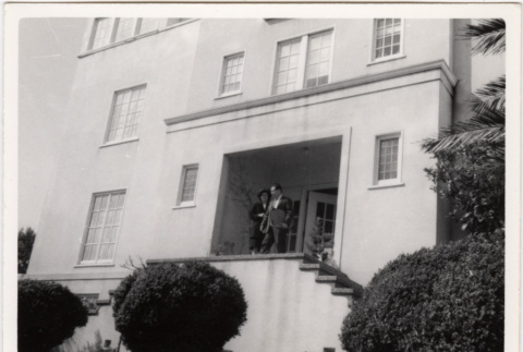 Tomoye and Henri Takahashi in front of house (ddr-densho-426-92)