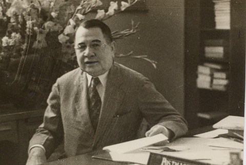 John H. Wilson sitting at a desk (ddr-njpa-2-910)