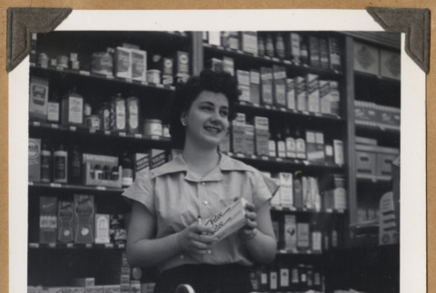 Woman behind a counter (ddr-densho-542-95)