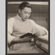 Man reading a book (ddr-densho-287-132)