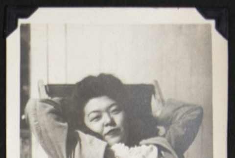 Alcie posing in a chair (ddr-densho-542-687)