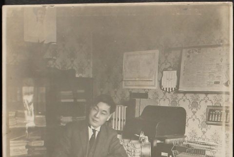 Issei newspaper editor in his office (ddr-densho-259-235)