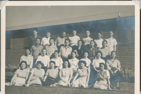 Large group posing outside barracks (ddr-densho-493-113)