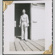 Man with clipboard on loading dock (ddr-densho-434-237)