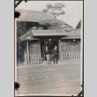 Two men in front of building (ddr-densho-326-136)