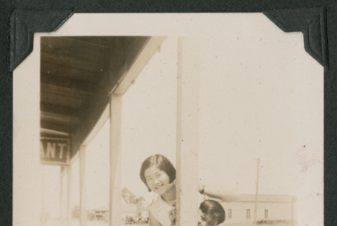 two kids posing around a post (ddr-densho-378-492)