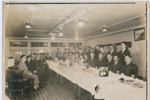 A group gathered for a dinner (ddr-densho-278-26)
