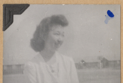 Smiling young woman (ddr-densho-542-246)