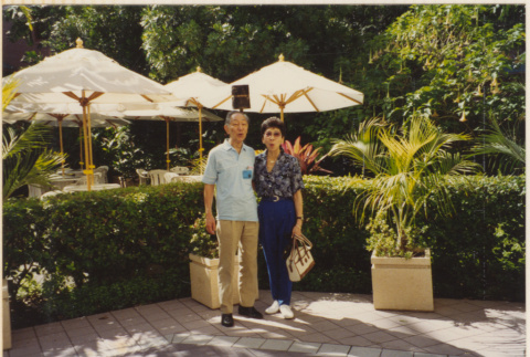 Couple standing in patio (ddr-densho-466-484)