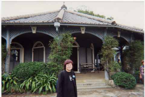 Tomoye Takahashi outside Thomas Glover House (ddr-densho-426-577)