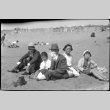 Group sitting on beach (ddr-densho-426-2015)