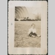 A baby sitting in a field (ddr-densho-298-31)