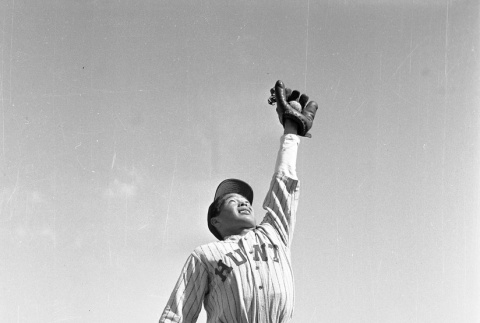 Baseball player catching a fly ball (ddr-fom-1-753)