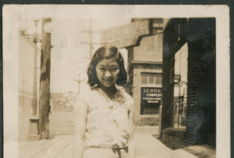 Woman on sidewalk (ddr-densho-316-180)
