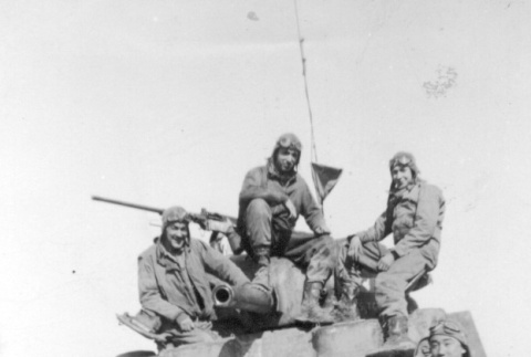Soldiers on a tank (ddr-densho-92-22)