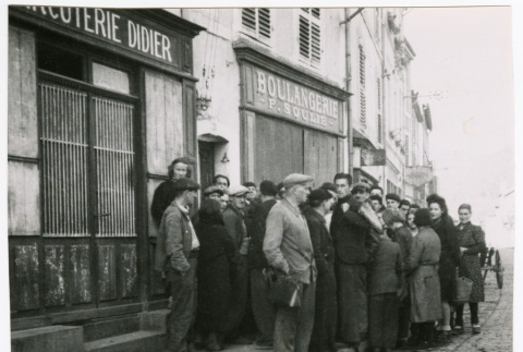 Crowd outside Boulangerie in Bruyeres (ddr-densho-1007-36)