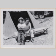Man and two boys in front of tent (ddr-densho-522-307)