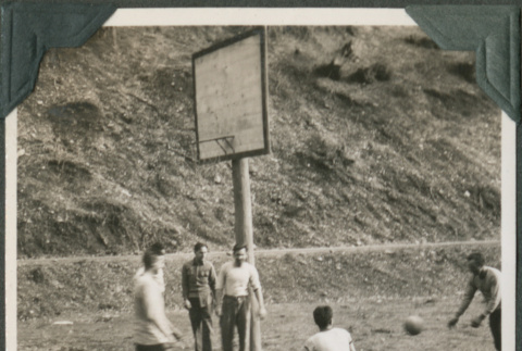 Men playing basketball (ddr-ajah-2-355)