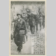 Pvt. Yoshihana leading Nazi prisoners (ddr-densho-37-2019)