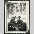 Two young women at a campsite (ddr-densho-542-386)