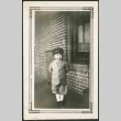 Young boy by brick wall (ddr-densho-293-110)