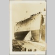 The HMS King George V leaving a dry dock (ddr-njpa-13-514)