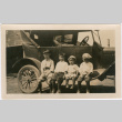 Four boys sitting on car (ddr-densho-458-26)