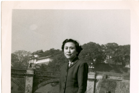 Woman standing by bridge (ddr-densho-430-211)