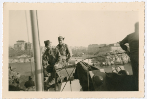 Soldiers on ship near shore (ddr-densho-368-128)