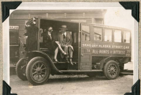 Man and woman in Skagway street car (ddr-densho-383-20)