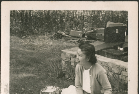Woman changing baby (ddr-densho-293-161)