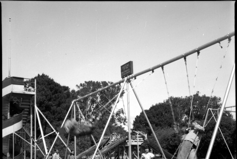 Kids on swings in park (ddr-densho-426-959)