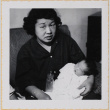 Yoshiko Shiomi holding Leslie Shiomi (ddr-densho-522-353)