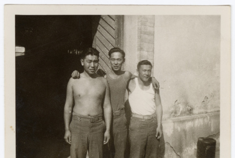 Three soldiers in a doorway (ddr-densho-451-16)