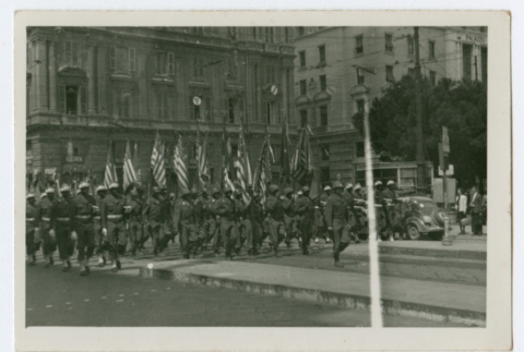 Soldiers marching in city street (ddr-densho-368-98)