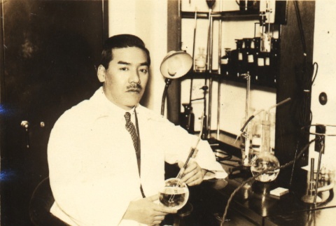 Seiji Onishi, an engineer posing with research equipment (ddr-njpa-4-1526)