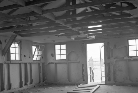 Interior of a barracks being renovated or demolished (ddr-fom-1-654)