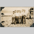 Seven men standing on shore (ddr-densho-383-17)