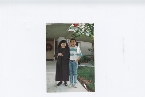 (Photograph) - Image of elderly nun with young man (Front) (ddr-densho-330-293-master-6771b21f3f)