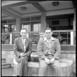 Two men seated by fountain (ddr-densho-426-266)